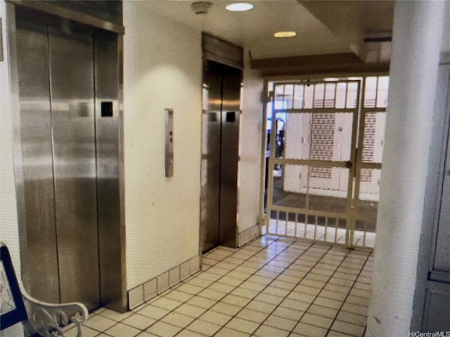 2450 Koa Ave Unit 35, Honolulu, HI 96815 - hallway featuring light tile patterned floors