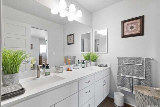 91-3475 Nana Hope St Unit 601, Ewa Beach, HI 96706 - full bathroom featuring double vanity and wood finished floors