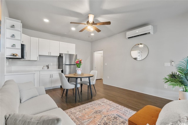 91-3475 Nana Hope St Unit 601, Ewa Beach, HI 96706 - dining room with a wall unit AC, ceiling fan, dark wood-style floors, and recessed lighting