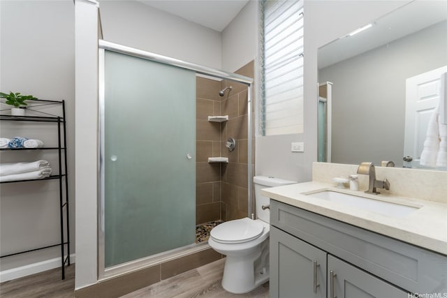 5216 Hao Pl, Honolulu, HI 96821 - full bath with vanity, a stall shower, and wood finished floors