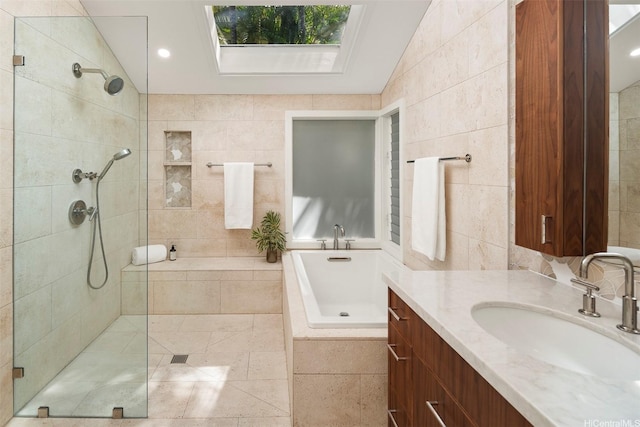 4758 Aukai Ave, Honolulu, HI 96816 - bathroom with a bath, vanity, walk in shower, tile walls, and a skylight