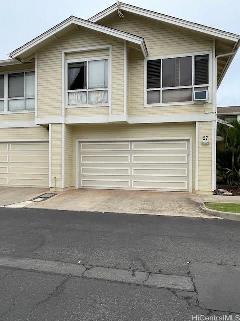 91-1020 Laaulu St Unit 27C, Ewa Beach, HI 96706 - view of front of property with an attached garage and driveway