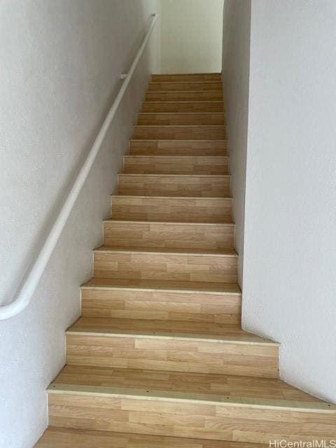 91-1020 Laaulu St Unit 27C, Ewa Beach, HI 96706 - staircase featuring wood finished floors