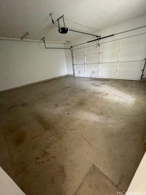 91-1020 Laaulu St Unit 27C, Ewa Beach, HI 96706 - garage with a garage door opener