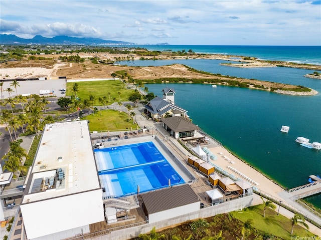 91-1312 Keoneula Blvd Unit 203, Ewa Beach, HI 96706 - drone / aerial view of a water and mountain view and a pool