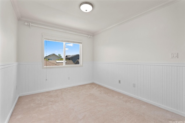 91-1312 Keoneula Blvd Unit 203, Ewa Beach, HI 96706 - empty room featuring ornamental molding, wainscoting, and carpet