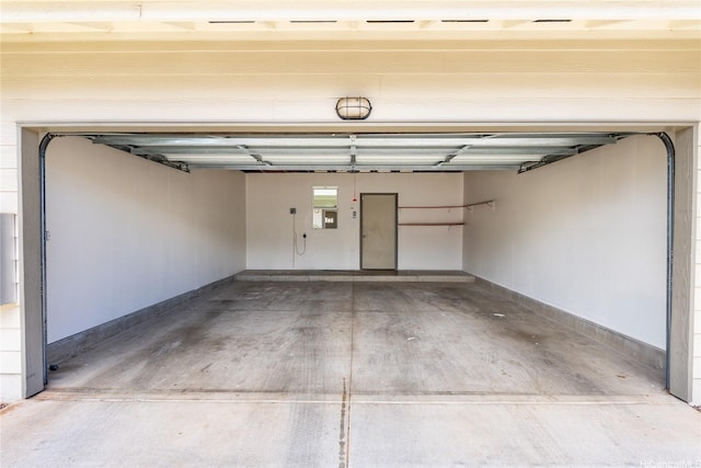 91-1312 Keoneula Blvd Unit 203, Ewa Beach, HI 96706 - garage with baseboards and electric panel