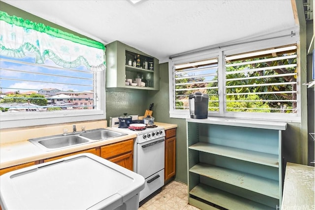 912 Ocean View Dr, Honolulu, HI 96816 - kitchen featuring open shelves, white gas range, light countertops, brown cabinets, and lofted ceiling