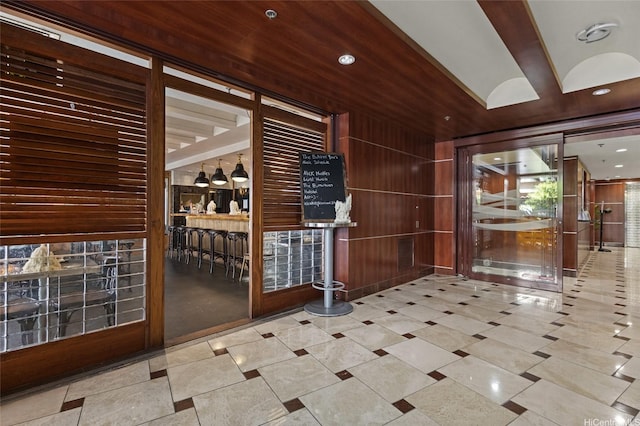 364 Seaside Ave Unit 1211, Honolulu, HI 96815 - wine area featuring a dry bar, wood walls, and recessed lighting