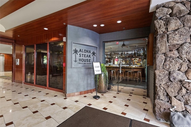 364 Seaside Ave Unit 1211, Honolulu, HI 96815 - welcome area with a bar, recessed lighting, and wood ceiling