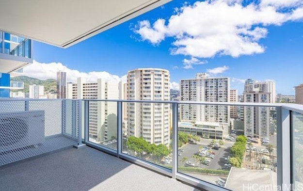 629 Keeaumoku St Unit 1303, Honolulu, HI 96814 - balcony featuring a city view