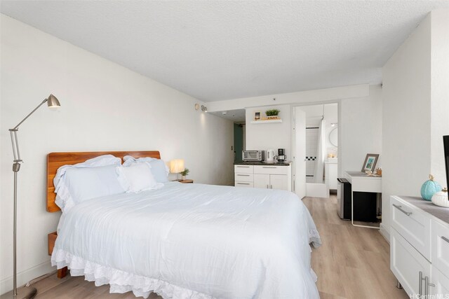 444 Niu St Unit 2403, Honolulu, HI 96815 - bedroom with light wood-style floors