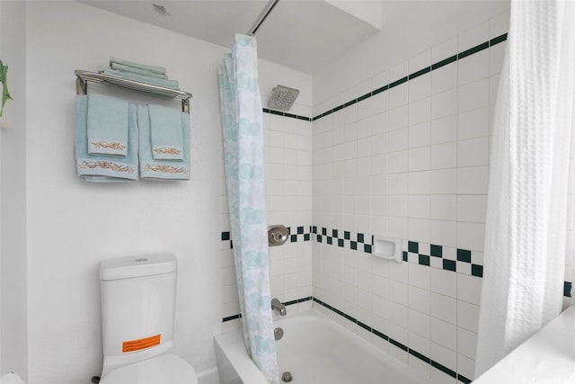 444 Niu St Unit 2403, Honolulu, HI 96815 - full bath featuring shower / bath combo with shower curtain and toilet