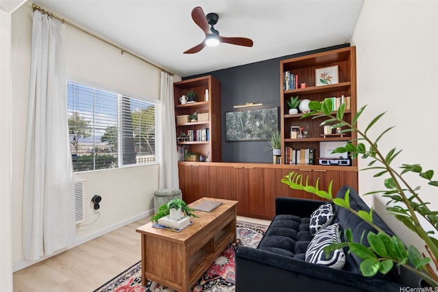 91-1021 Kaileolea Dr Unit H3, Ewa Beach, HI 96706 - sitting room featuring ceiling fan and wood finished floors