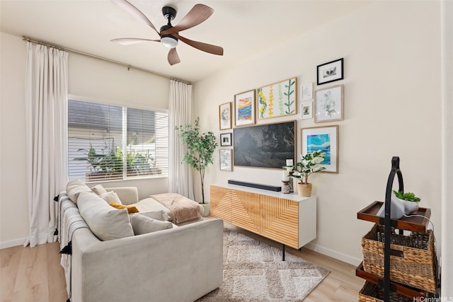 91-1021 Kaileolea Dr Unit H3, Ewa Beach, HI 96706 - living room featuring light wood finished floors and a ceiling fan