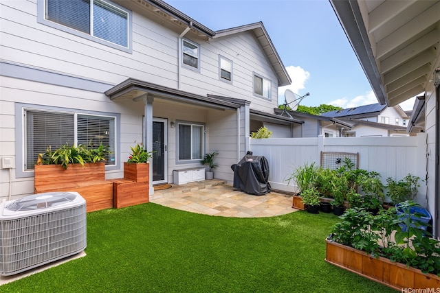 91-1021 Kaileolea Dr Unit H3, Ewa Beach, HI 96706 - rear view of house with a patio