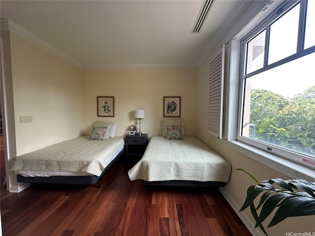 1740 S Beretania St Unit 33, Honolulu, HI 96826 - bedroom featuring dark wood-style flooring and ornamental molding