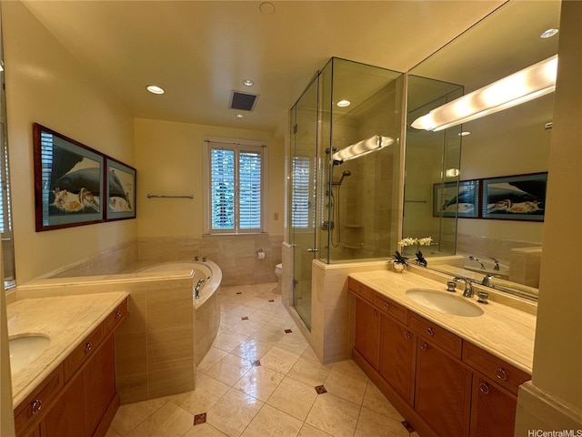 1740 S Beretania St Unit 33, Honolulu, HI 96826 - full bath featuring tile patterned floors, two vanities, a garden tub, a stall shower, and recessed lighting