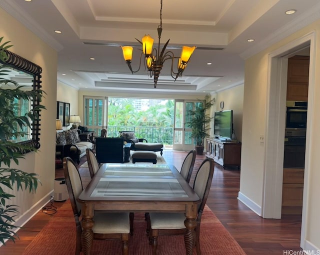 1740 S Beretania St Unit 33, Honolulu, HI 96826 - dining room with a tray ceiling, dark wood-type flooring, a chandelier, ornamental molding, and recessed lighting