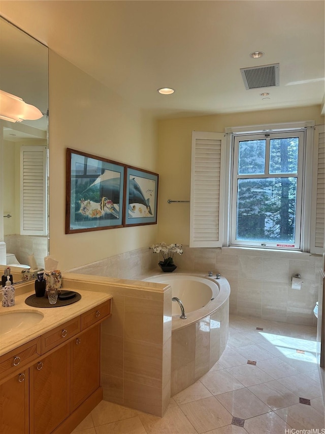 1740 S Beretania St Unit 33, Honolulu, HI 96826 - full bath featuring a garden tub, vanity, tile patterned flooring, and recessed lighting