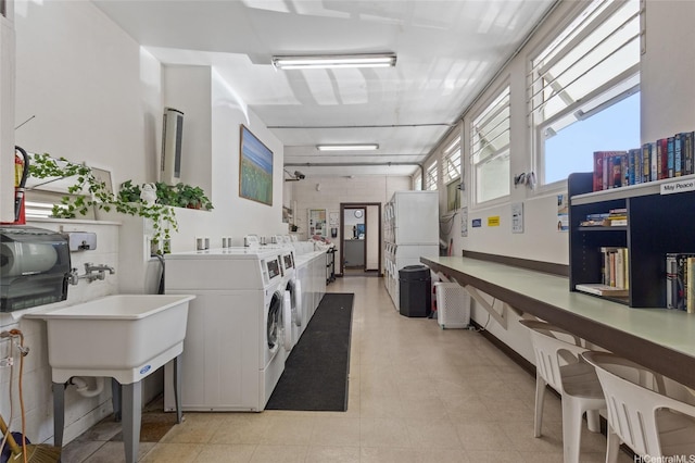 445 Kaiolu St Unit 401, Honolulu, HI 96815 - shared laundry featuring independent washer and dryer and stacked washer and clothes dryer