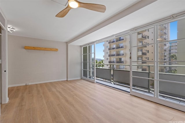 445 Kaiolu St Unit 401, Honolulu, HI 96815 - unfurnished room with wood finished floors and a ceiling fan