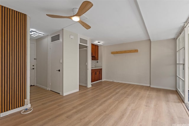 445 Kaiolu St Unit 401, Honolulu, HI 96815 - unfurnished living room featuring light wood-type flooring and ceiling fan