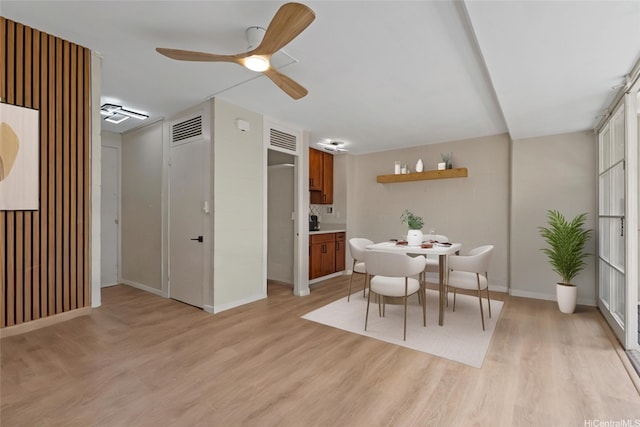 445 Kaiolu St Unit 401, Honolulu, HI 96815 - dining room featuring light wood-type flooring and ceiling fan