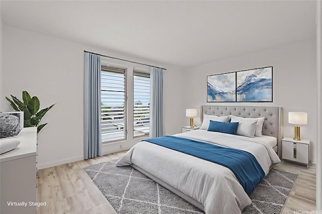 94-1069 Anania Cir Unit 16, Mililani, HI 96789 - bedroom featuring light wood-style floors and baseboards