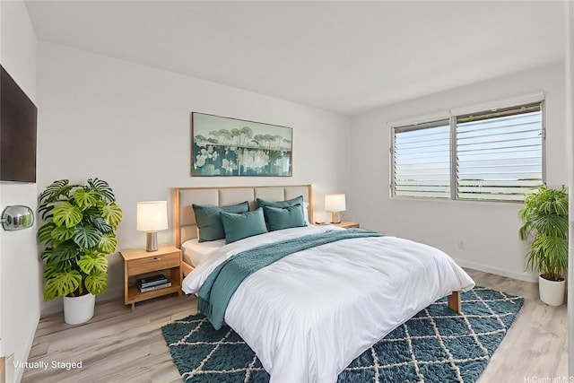 94-1069 Anania Cir Unit 16, Mililani, HI 96789 - bedroom featuring wood finished floors and baseboards