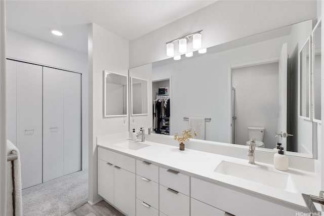 91-1641 Honouliuli St Unit 42, Ewa Beach, HI 96706 - full bathroom with double vanity, a shower, a walk in closet, and recessed lighting
