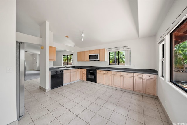 91-1517 Wahane St, Kapolei, HI 96707 - kitchen with light brown cabinets, black dishwasher, vaulted ceiling, white microwave, and freestanding refrigerator