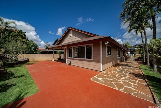 91-1517 Wahane St, Kapolei, HI 96707 - back of property featuring a patio