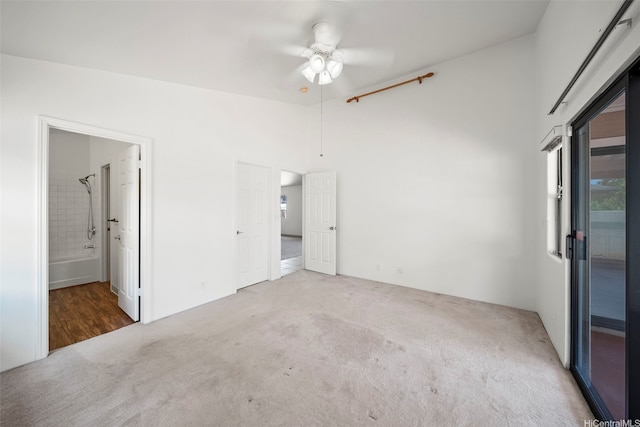 91-1517 Wahane St, Kapolei, HI 96707 - unfurnished bedroom with carpet, connected bathroom, access to exterior, and ceiling fan