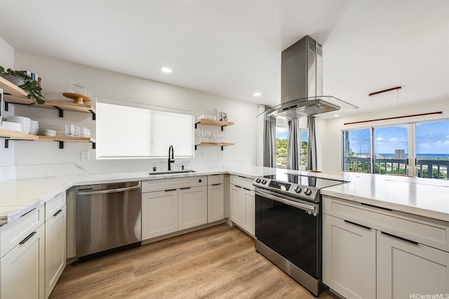 3795 Anuhea St, Honolulu, HI 96816 - kitchen with appliances with stainless steel finishes, open shelves, island exhaust hood, recessed lighting, and light wood-type flooring