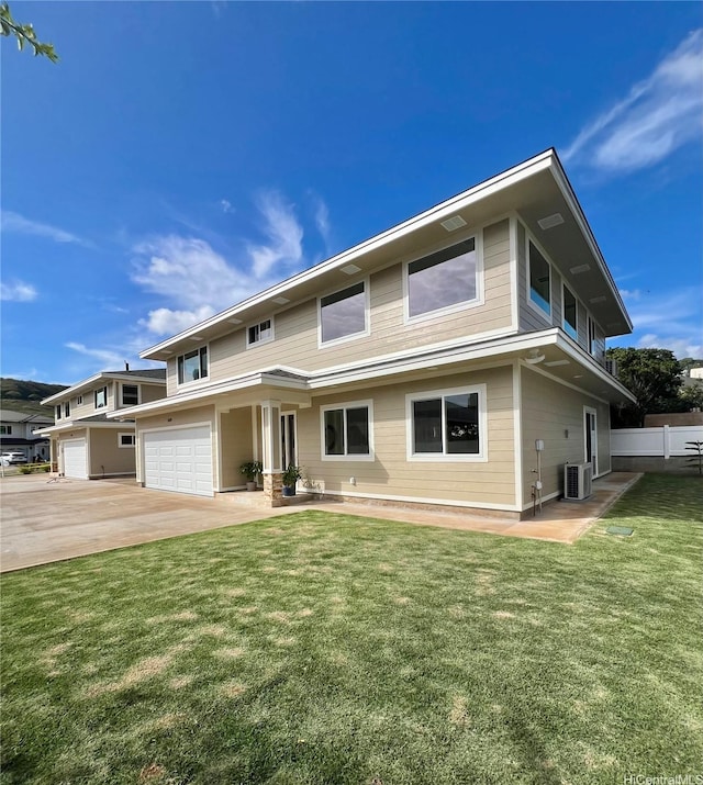 1689 Lewalani Dr, Honolulu, HI 96822 - view of front of home featuring an attached garage and driveway