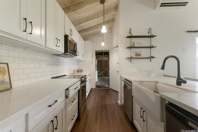 1482 Honokahua St, Honolulu, HI 96825 - kitchen with stainless steel appliances, dark wood-type flooring, tasteful backsplash, light countertops, and white cabinets