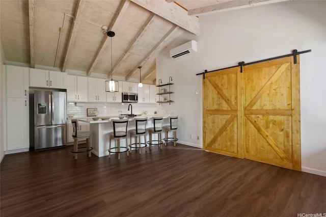 1482 Honokahua St, Honolulu, HI 96825 - kitchen featuring stainless steel appliances, a wall mounted air conditioner, a breakfast bar, and dark wood-style flooring