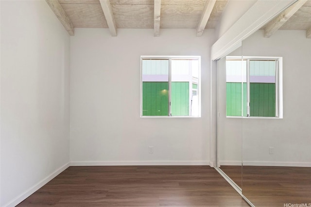 1482 Honokahua St, Honolulu, HI 96825 - empty room with beam ceiling and wood finished floors