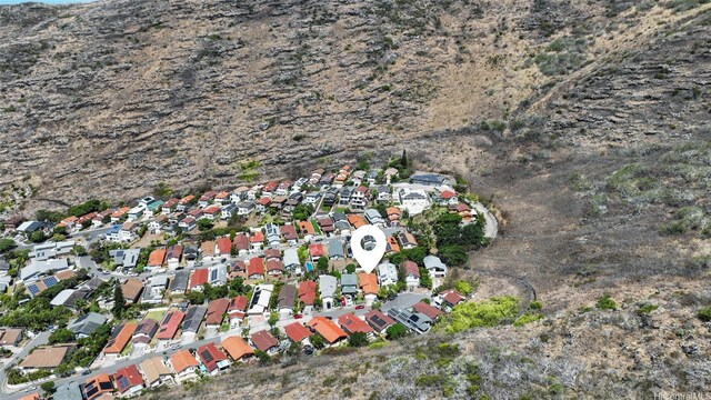 1482 Honokahua St, Honolulu, HI 96825 - aerial view of property and surrounding area featuring a mountain backdrop and nearby suburban area