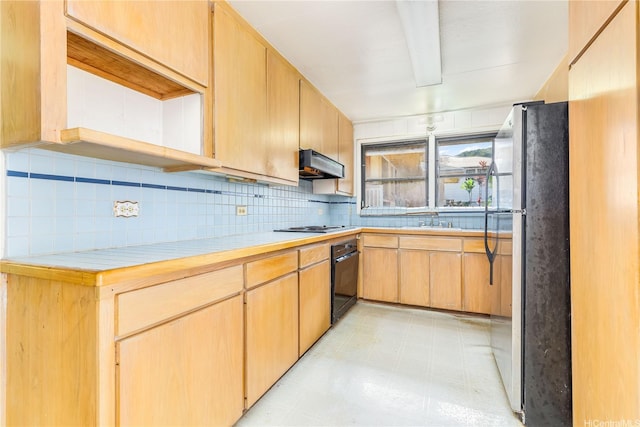 3038 Lanikaula St, Honolulu, HI 96822 - kitchen featuring freestanding refrigerator, oven, under cabinet range hood, tasteful backsplash, and light countertops