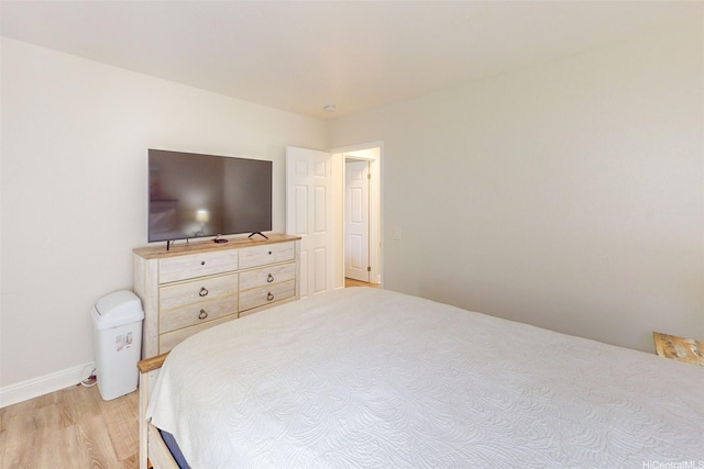 84-687 Ala Mahiku St Unit 120B, Waianae, HI 96792 - bedroom featuring light wood-type flooring and baseboards