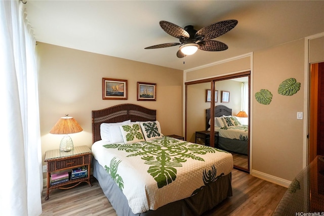 57-101 Kuilima Dr Unit 189, Kahuku, HI 96731 - bedroom with a closet, wood finished floors, and ceiling fan