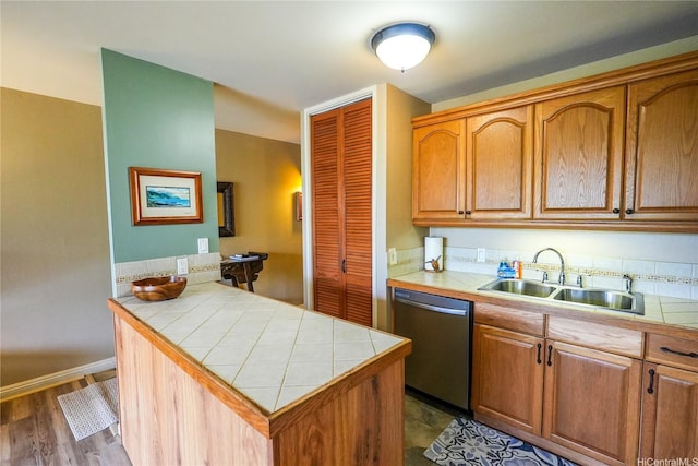 57-101 Kuilima Dr Unit 189, Kahuku, HI 96731 - kitchen with dishwasher, tile countertops, and brown cabinets
