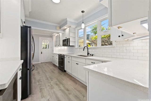 1186 Alewa Dr, Honolulu, HI 96817 - kitchen with appliances with stainless steel finishes, ornamental molding, white cabinetry, light stone counters, and backsplash