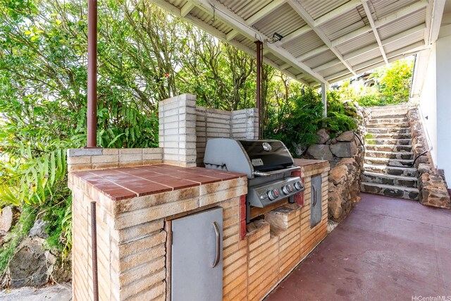 1186 Alewa Dr, Honolulu, HI 96817 - view of patio featuring area for grilling and stairs