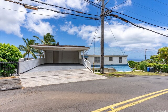1186 Alewa Dr, Honolulu, HI 96817 - view of front of property with a carport and driveway