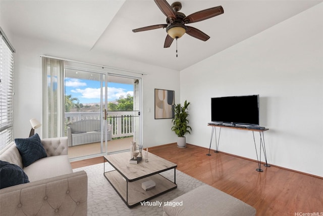 94-510 Lumiaina St Unit J202, Waipahu, HI 96797 - living room with wood finished floors, ceiling fan, and vaulted ceiling