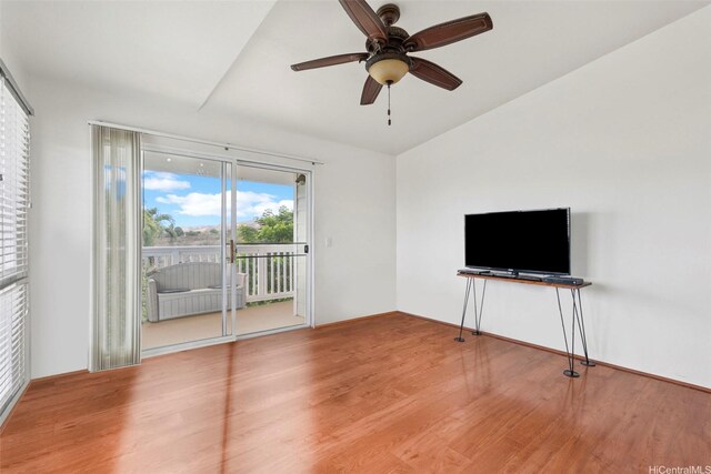 94-510 Lumiaina St Unit J202, Waipahu, HI 96797 - unfurnished living room featuring wood finished floors, ceiling fan, and vaulted ceiling