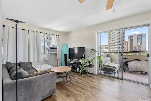 509 University Ave Unit 1001, Honolulu, HI 96826 - living area with ceiling fan, wood finished floors, and cooling unit
